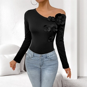 Slim fit black off-shoulder bodysuit with 3D floral accents and asymmetric long sleeves