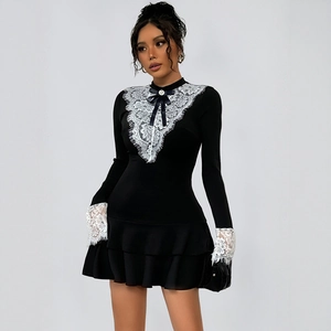 Elegant French vintage black mini dress with lace collar and bowknot detail