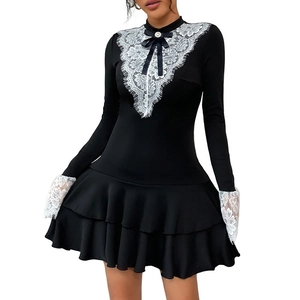 Elegant black long sleeve dress with white lace V-neck and ruffles in vintage style