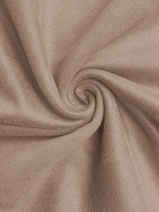 Gros plan sur la texture velours kaki doux avec détail de pli en spirale élégant