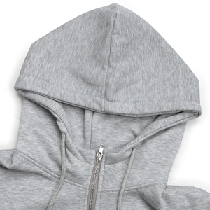Detail of grey zip-up hoodie featuring cotton texture, metal zipper and adjustable drawstring