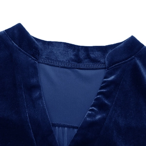 Detail of navy blue velvet dress featuring a sophisticated V-neck stand collar design