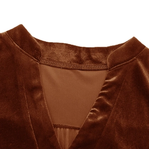 Detailed macro view of the V-neck velvet dress collar with refined stitching and texture