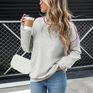 Grey oversized crewneck sweatshirt with contrast pink trim and dropped shoulders for women