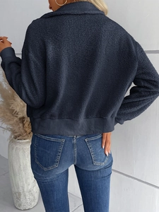 Vue arrière de la veste en polaire teddy bleu marine avec poignets en maille côtelée