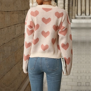 Sweet pink heart pattern knitted crewneck sweater for women shown from the back view