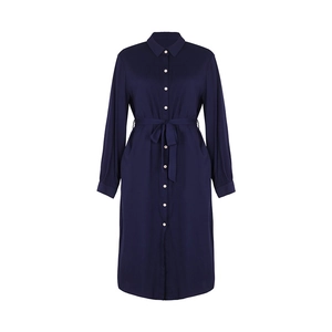 Close-up of dark blue shirt dress featuring classic collar, button-up front and waist tie