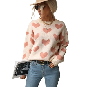 Sweet cream knit sweater with pink heart patterns and crew neck for women