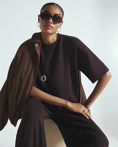 Deep burgundy two-piece set featuring short sleeve top and pants with layered jacket style