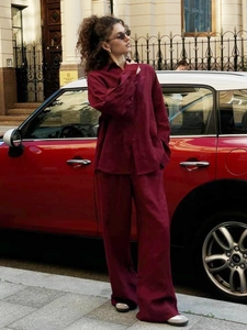 Deep red cotton two-piece set featuring oversized shirt and wide-leg trousers in street style