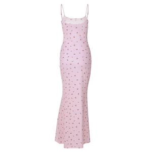 Close-up of pink cherry print dress with slim fit cut and thin shoulder straps