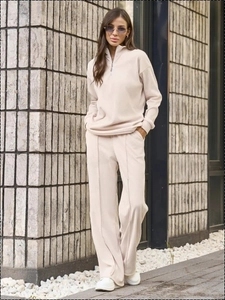 Women's beige ribbed knit two-piece set with half-zip stand collar and wide-leg trousers