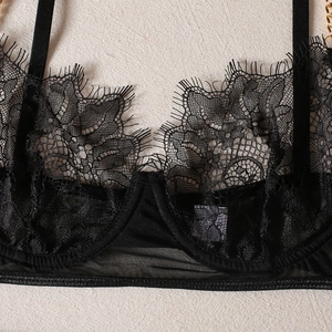 Black eyelash lace lingerie set with underwire cups and decorative gold chain details