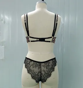Detail of leopard print bra and black lace eyelash edge panties with multi-strap back design