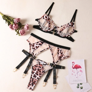 Three-piece leopard print lingerie set with adjustable garter belt and matching thong