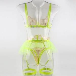 Detailed view of neon green lace lingerie set with mesh skirt and garter belt set