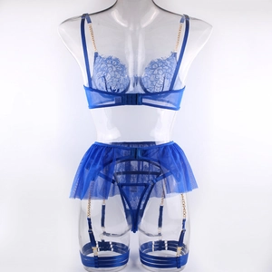 Detailed view of royal blue lace lingerie set with gold chain straps and mesh skirt