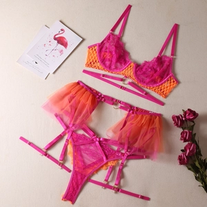Lace lingerie set featuring hot pink underwire bra with orange mesh trim detail