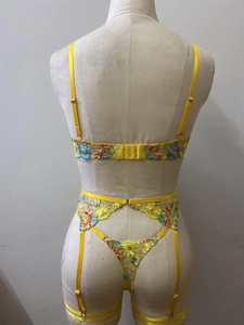Detailed back view of yellow floral embroidery lace lingerie set with adjustable straps
