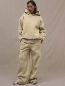 Minimalist khaki oversized hoodie and wide-leg jogger set with a drop shoulder design