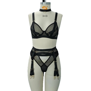 Sexy black mesh lingerie set with underwire bra, garter belt and metal ring details