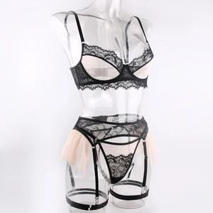 Detailed view of black lace lingerie set with underwire bra and pleated mesh skirt