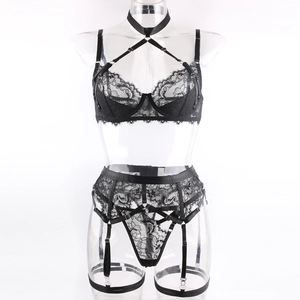 Detail view of black floral lace lingerie set with neck collar and garter belt straps