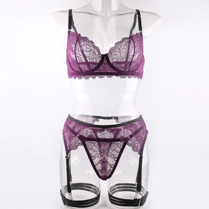 Detail of deep purple floral lace lingerie set with underwired bra and garter straps