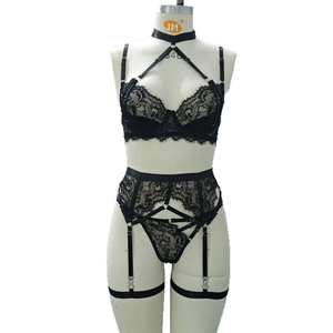 5-piece black floral lace lingerie set with harness bra and garter belt on mannequin