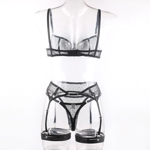 Detailed close-up of sheer black polka dot mesh lingerie set with adjustable straps