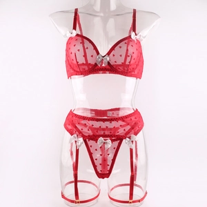 Detail view of red heart print mesh bra set with delicate white bows on a mannequin