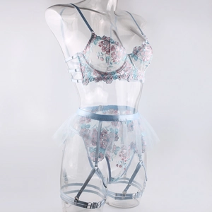 Detailed blue floral embroidery and sheer mesh texture on sexy lingerie set with garter