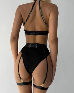 Black halter lingerie set with gold rings and adjustable garters back view