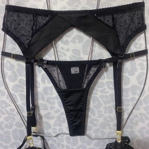 Sexy black polka dot mesh lingerie set with high-waist garter belt and bow details