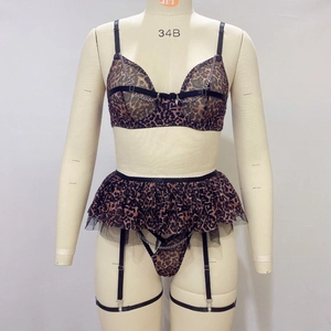 Leopard print three-piece lingerie set with luxury metal chain straps and ruffled garter