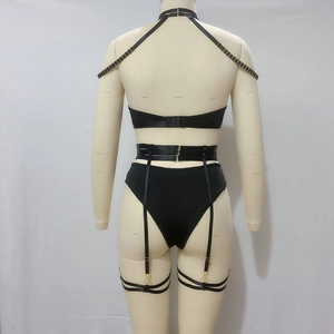 Sexy black multi-strap lingerie set with gold metal rings and adjustable harness, back view