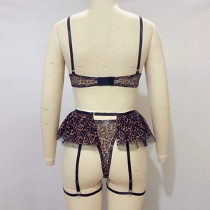 Rear view of leopard print mesh lingerie set with lace garter belt and metal chain detail