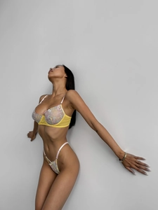 Sexy yellow floral embroidery lace bra and thong set with pink straps on model