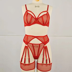 Close-up of red mesh lingerie set with underwire cups and gold ring details