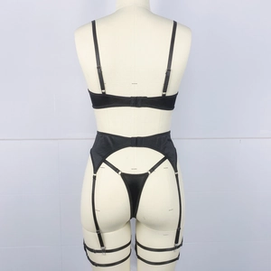 Rear view of black satin lingerie set with elastic straps and metal chain details