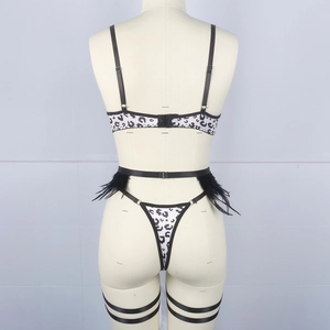 Rear view of leopard print lingerie set featuring black feather trim on waist belt