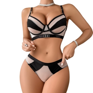 Two-piece mesh sheer lingerie set with black and white contrast stitching and metal rings