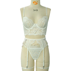 White floral lace lingerie set with pearl chains, underwire bra, and garter straps