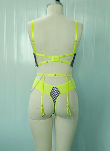 Detailed back view of neon lace lingerie set featuring metal chains and purple mesh detail