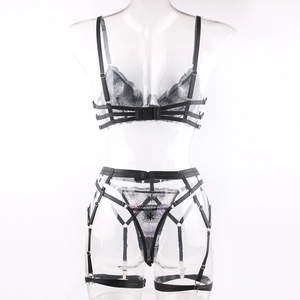 Detail view of black strappy lingerie set with purple floral embroidery on the back part