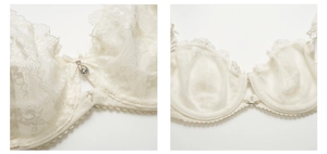 Détails du soutien-gorge en dentelle blanc cassé avec motifs floraux et pendentif strass