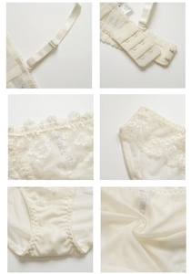 Détails d'ensemble de lingerie en dentelle crème avec broderies et bretelles réglables