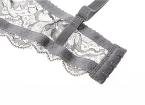 Close-up of gray lace bra featuring a 3-row 3-column hook-and-eye back closure