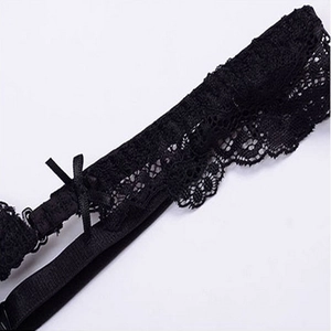 Elegant black lace bra strap with satin bow and adjustable metal buckle detail