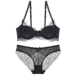Elegant black lace lingerie set with floral patterns and delicate ribbon details